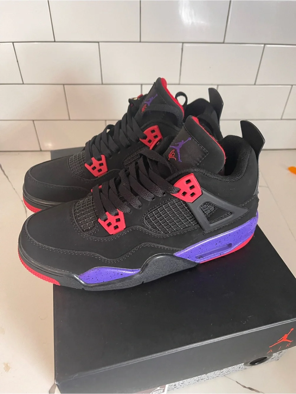 Men’s Retro 4 Raptor Size 5.5.